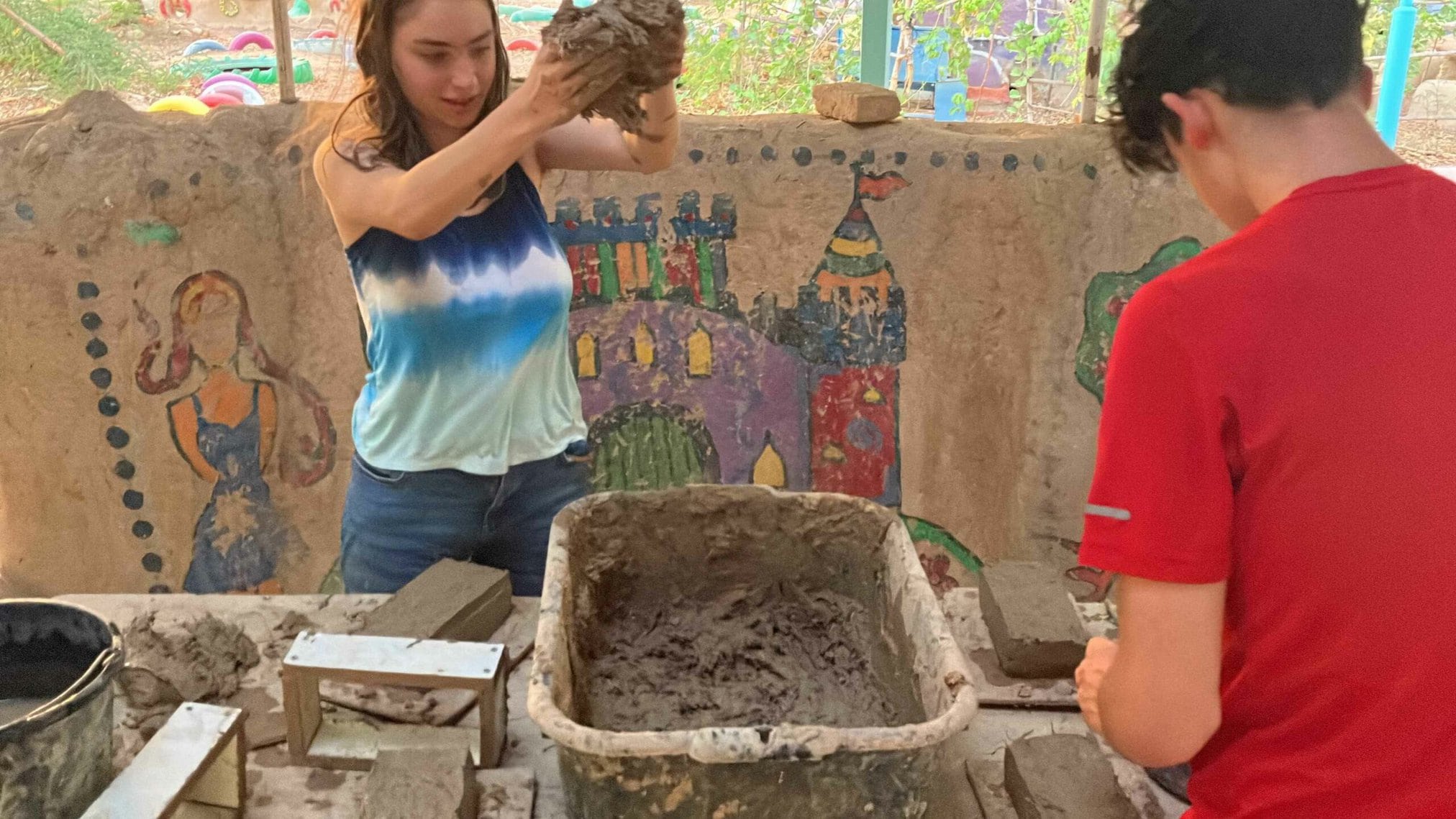 People making bricks