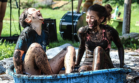 kids covered in mud